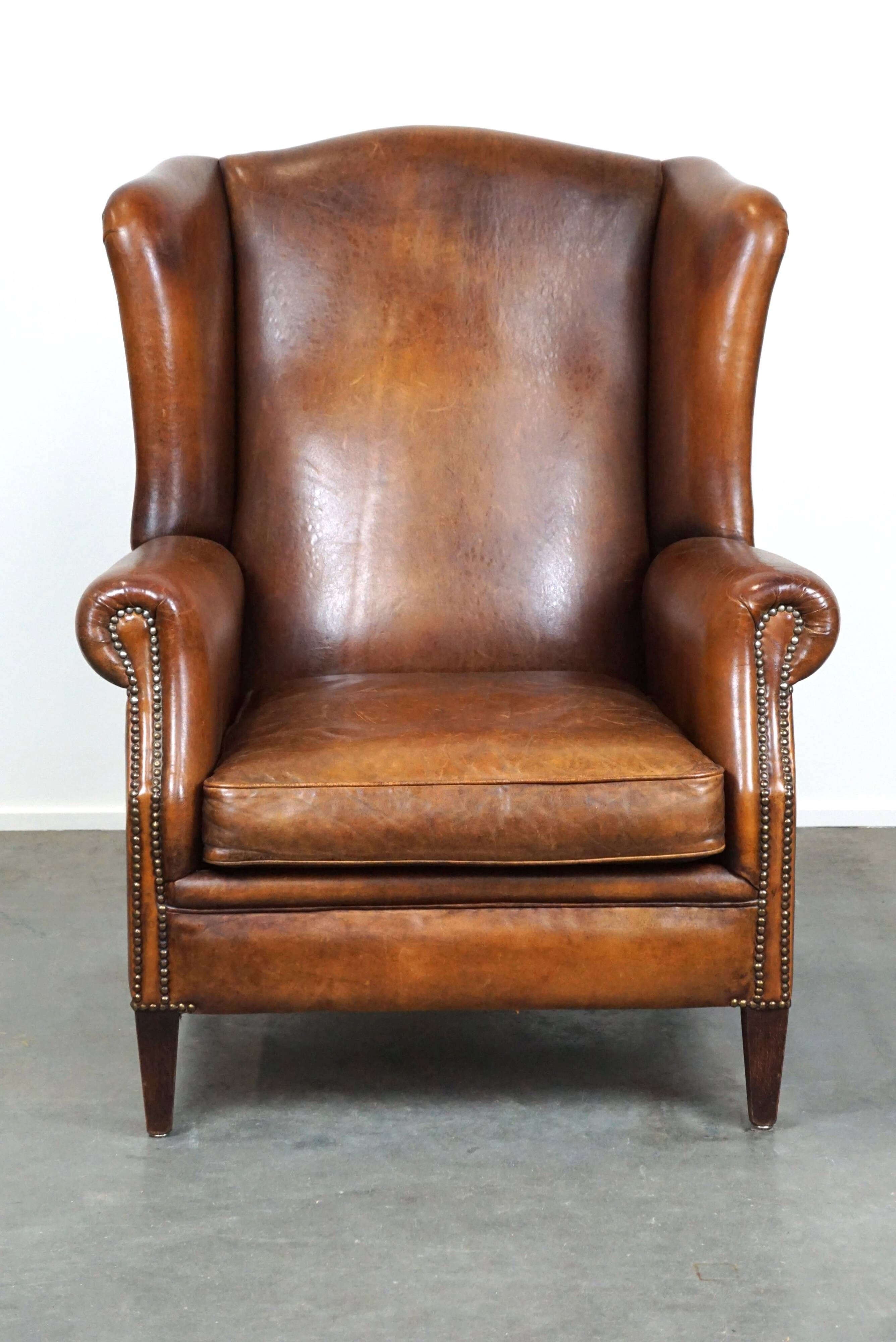 Especially comfortable wingback chair made of sheepskin leather, stunning colors