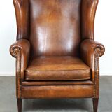 Especially comfortable wingback chair made of sheepskin leather, stunning colors
