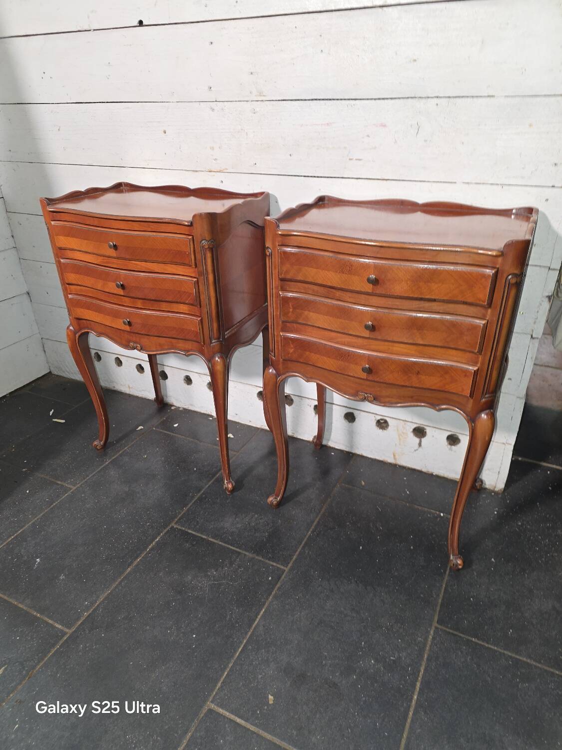 Pair of Louis XV style bedside tables in cherry wood marquetry.