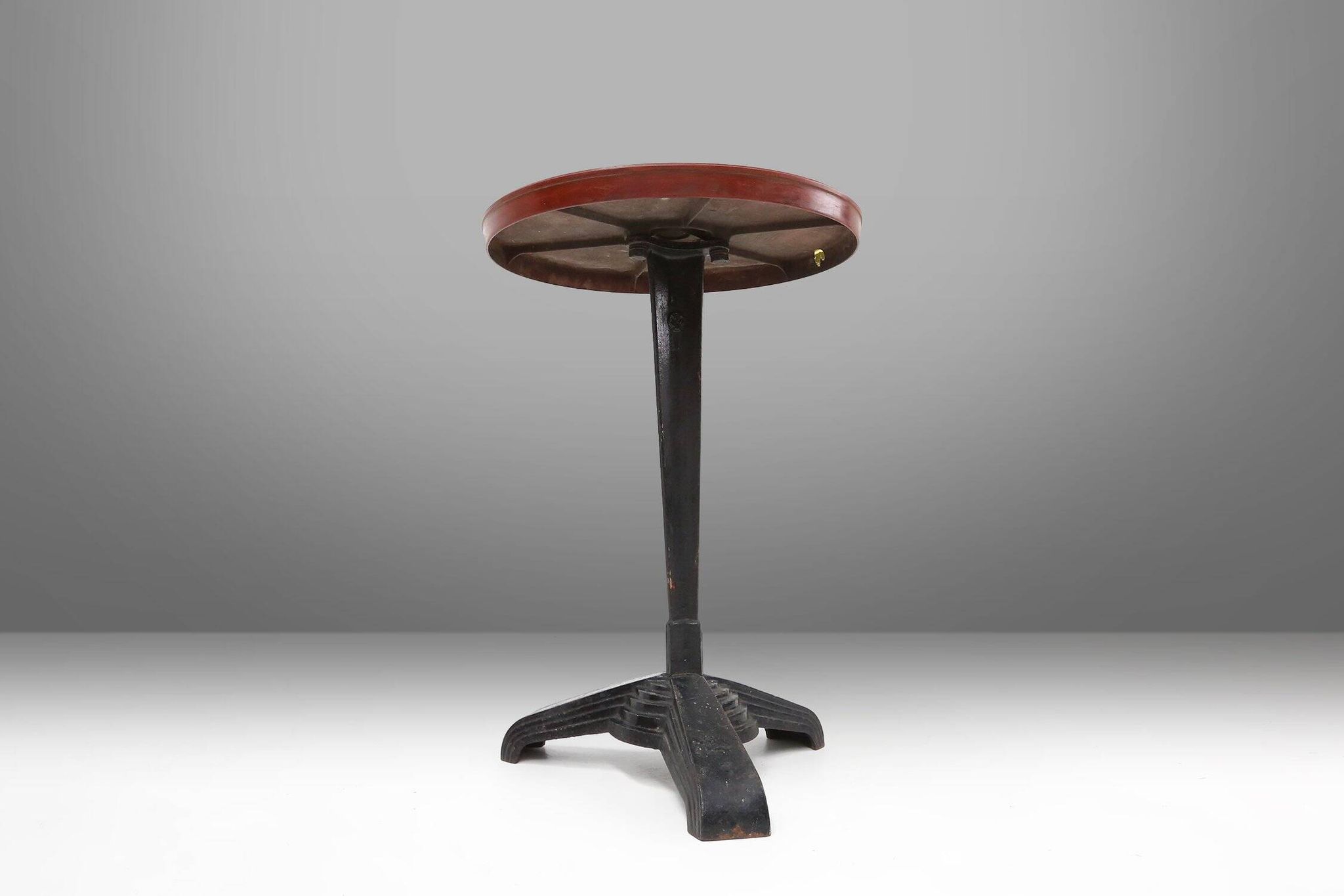 Cast Iron Bistro Table with Bakelite Top from Louis Vuitton, France, 1930s