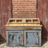 Showcase for boutique furniture, inclined boxes for presentation of collections on low sideboard