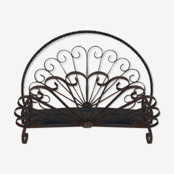 Old wrought iron magazine rack