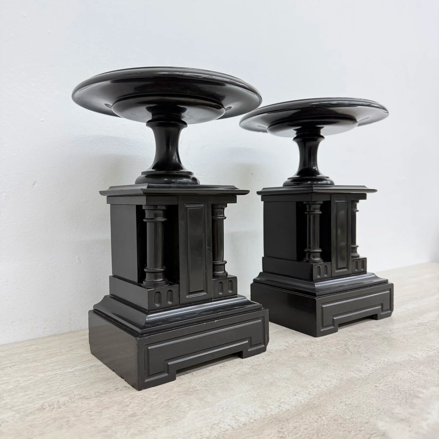 Antique French black marble cassoulets gilt decor pedestals neoclassical pair, 1900s