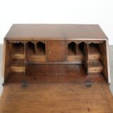 Antique English oak secretary from the 18th century with a stepped interior