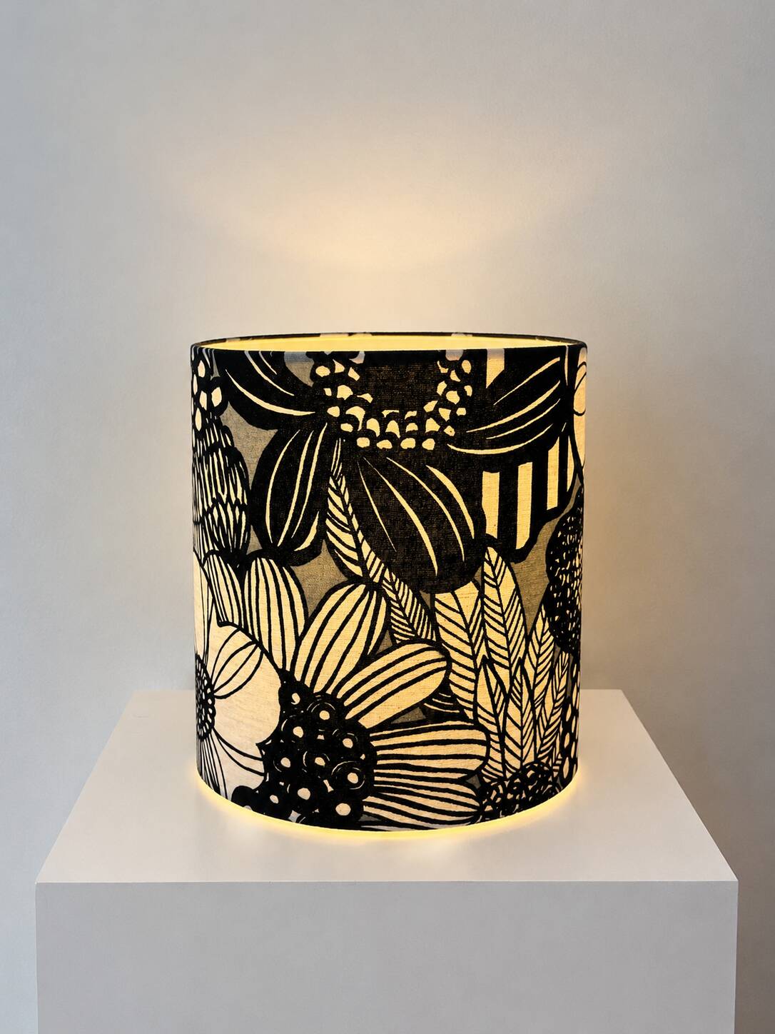 Lampshade covered with modern Japanese fabric featuring a floral pattern.
