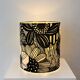 Lampshade covered with modern Japanese fabric featuring a floral pattern.