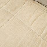 Deux fauteuils chauffeuses Cinna beige modèle Gao