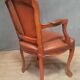 Louis XV style armchair covered in leather.