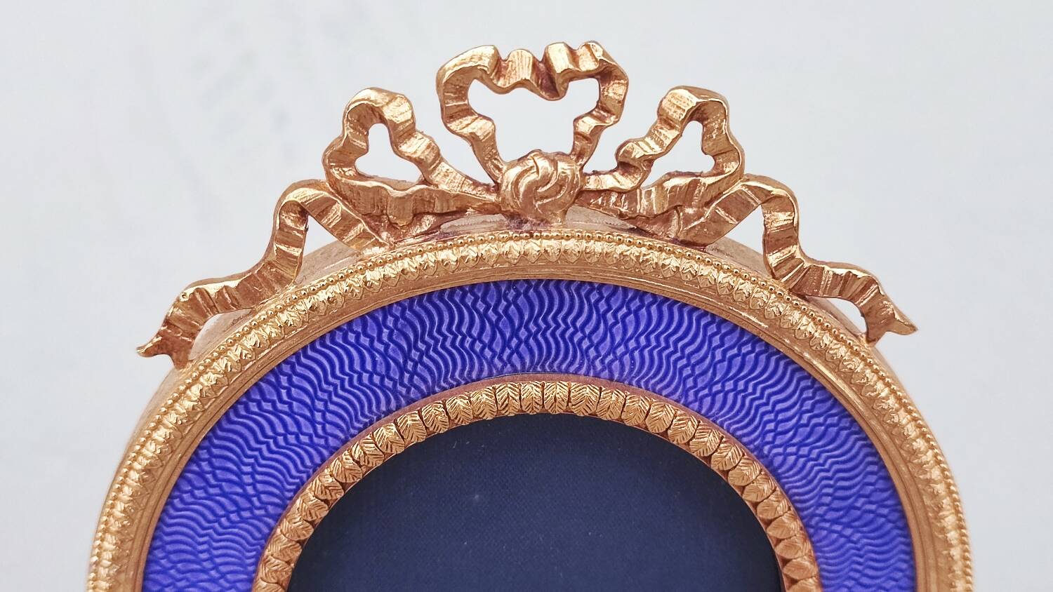 Miniature gilt metal and enamel photo frame