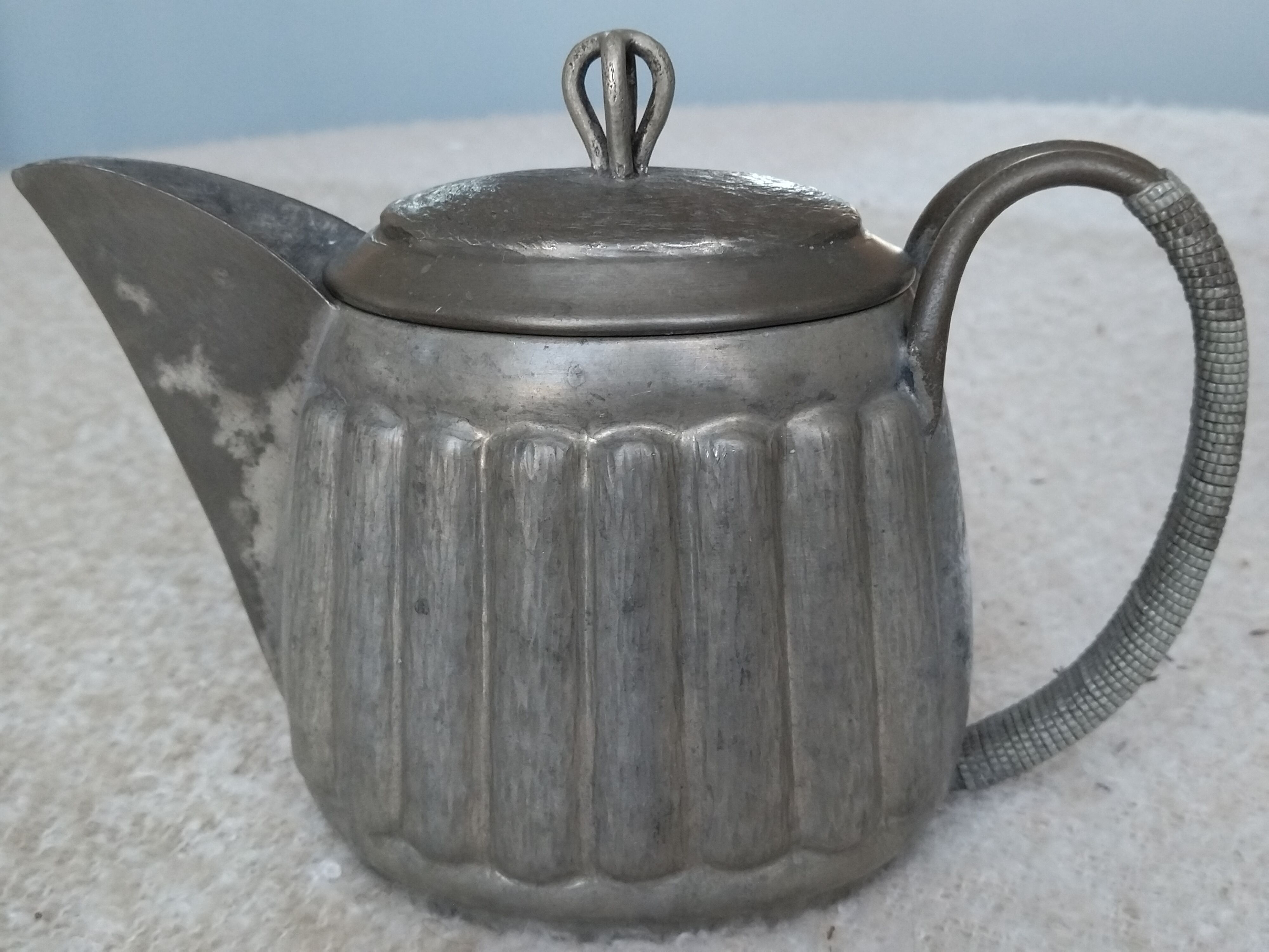 Art deco objects in their art tin juices