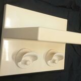 Plastic shelf with coat hang by Kartell
