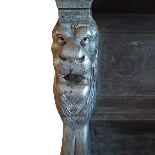 Carved two-body sideboard with 2 lions