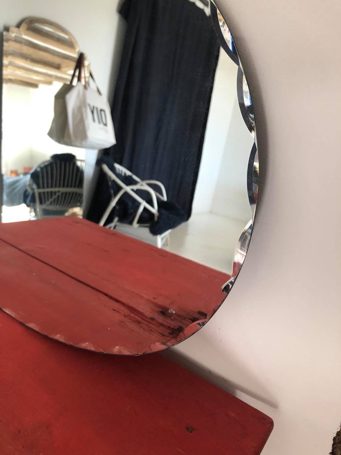 Old chissed oval mirror