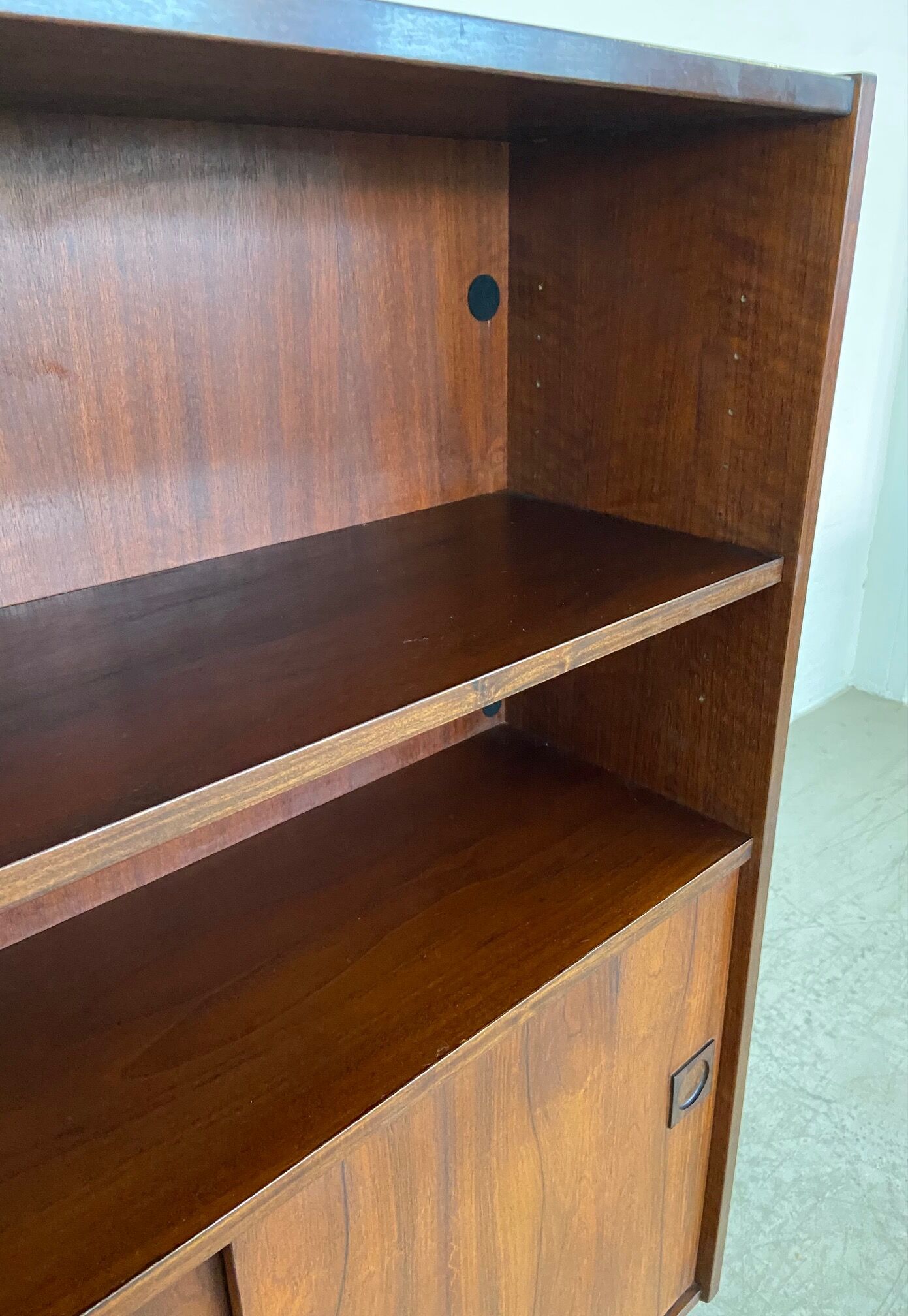 Danish retro vintage library in rosewood with sliding doors from the 1960s.