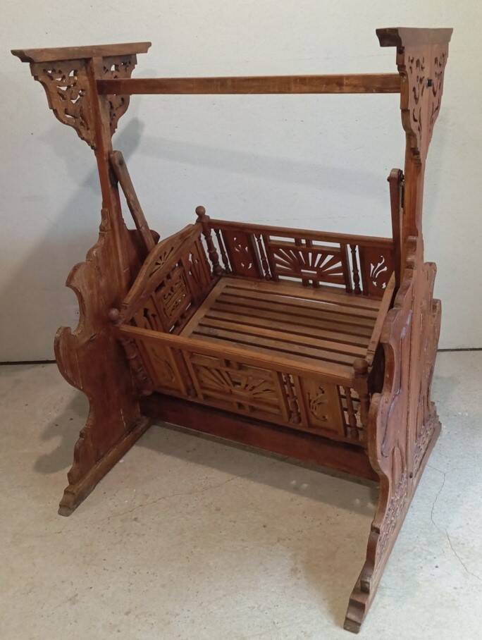 Solid teak carved swing cradle