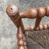 Antique Bobbin armchair with straw seat