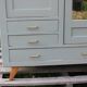 Vintage Parisian wardrobe in sage green – Mirror, hanging space and drawers