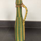 Bottle covered with rattan and scoubidou, 60s-70s
