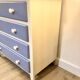 Wooden chest of drawers with tapered legs