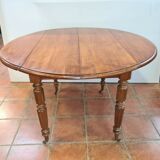 Round table 4 feet in cherry tree with 2 extensions