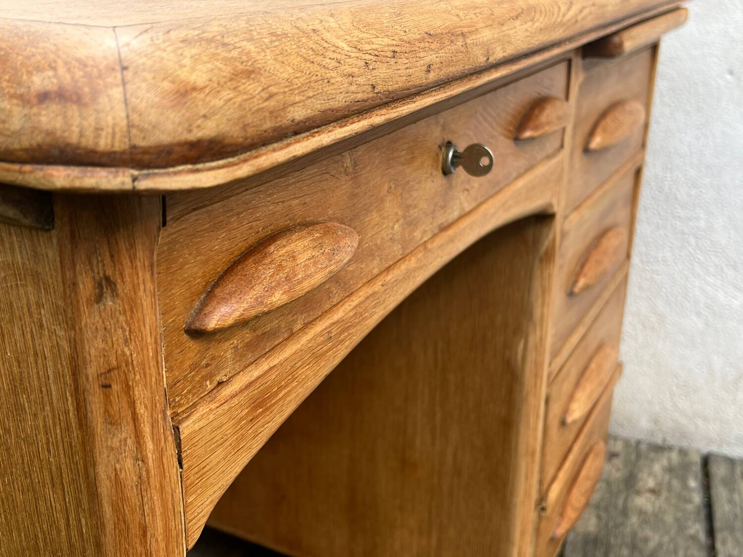 Antique light oak desk from the 1950s with 4 drawers