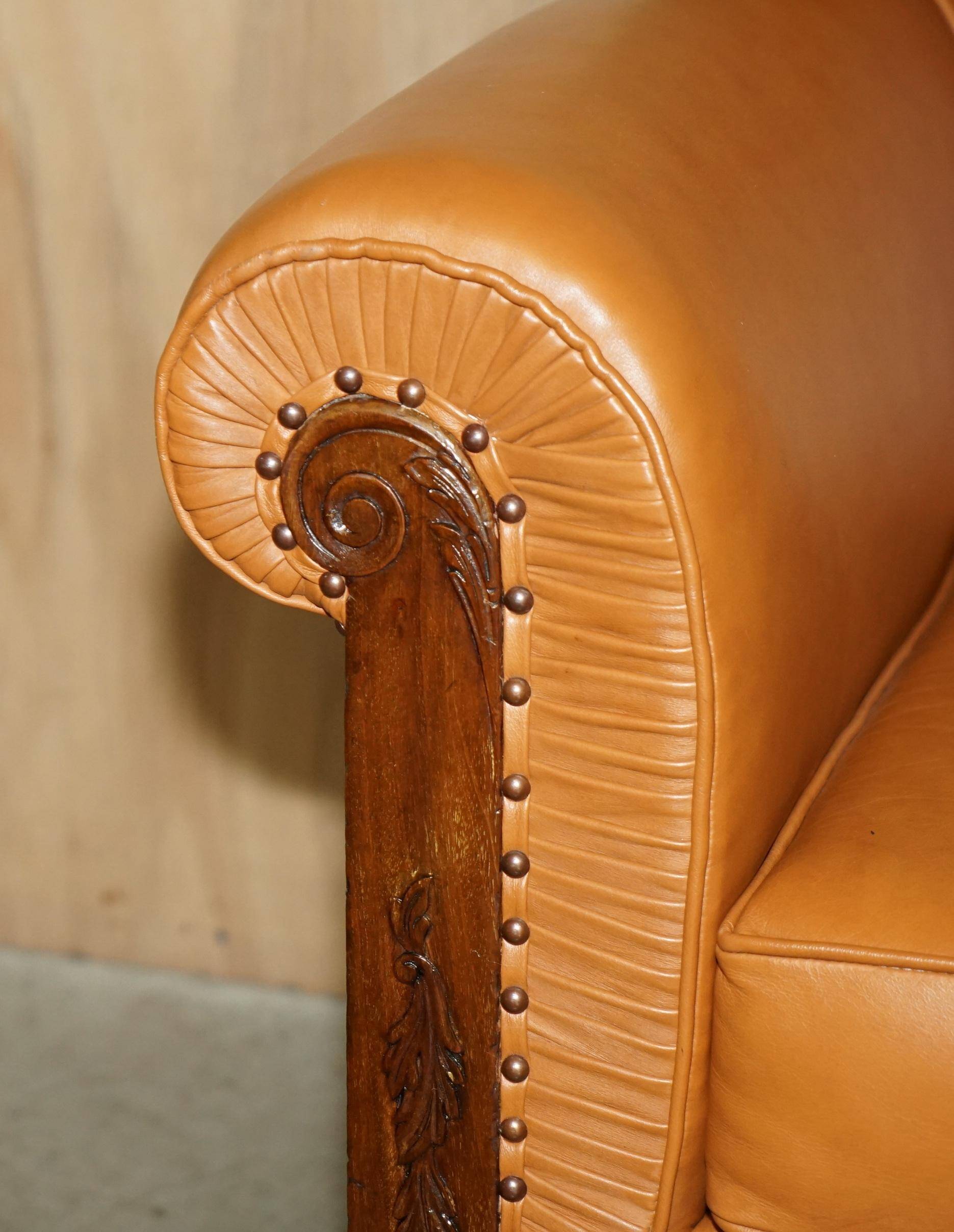 Restored three-seater leather canapé in late Victorian style.