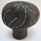 Anthropomorphic candle holder, scarified ceramic, stamped design