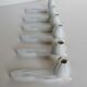 6 white porcelain knife holders
