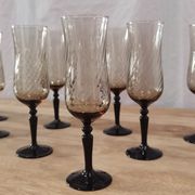 8 vintage smoked champagne flutes with black feet Arcoroc