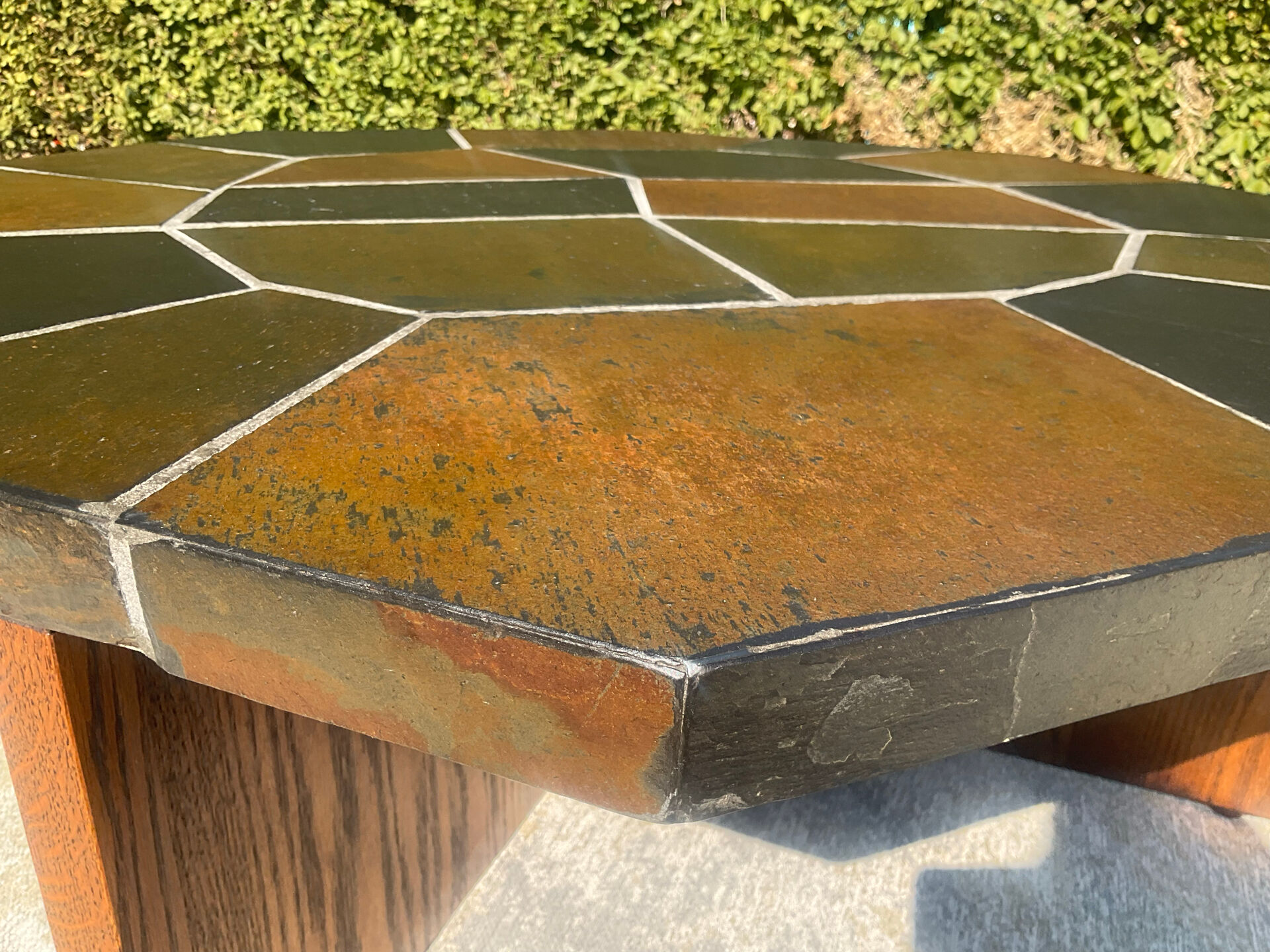 Brutalist octagonal coffee table from the 1970s in solid oak and slate.