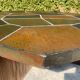 Brutalist octagonal coffee table from the 1970s in solid oak and slate.