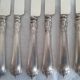 12 knives with silver-plated handles