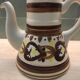 Hand-painted teapot signed Henriot in Quimper faience.