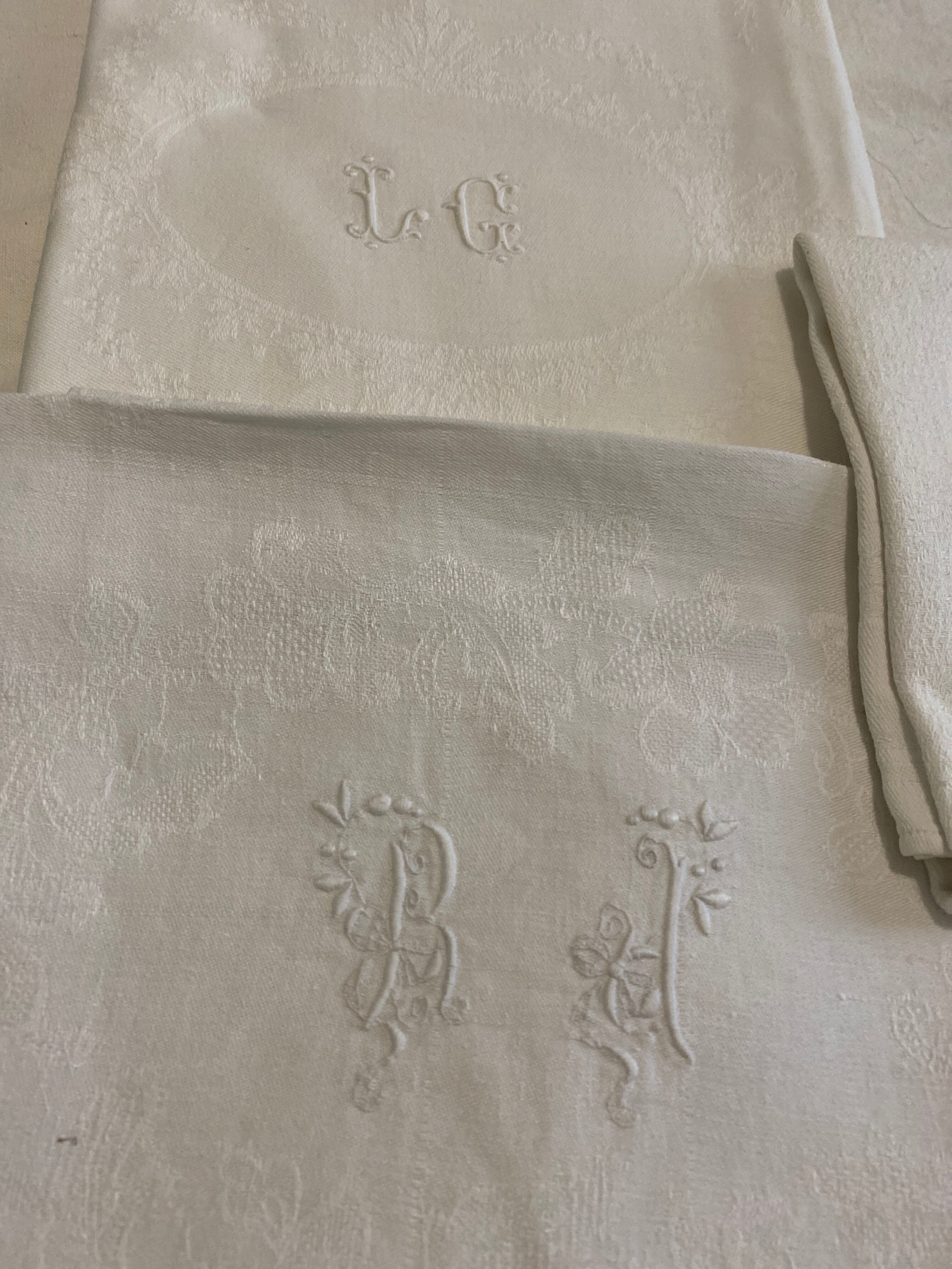 Three Bj LG monogram towels