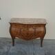 Commode style Louis XV en marqueterie et bois de rose
