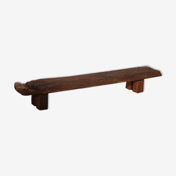 Tribal bench made of solid wood