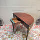 Half-moon table in mahogany from the Louis XVI period, 18th century.