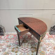 Half-moon table in mahogany from the Louis XVI period, 18th century.