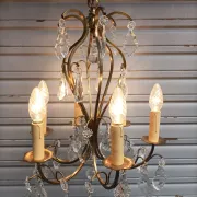 Remarkable cage chandelier with 6 lights and complete crystal pendants in working condition.