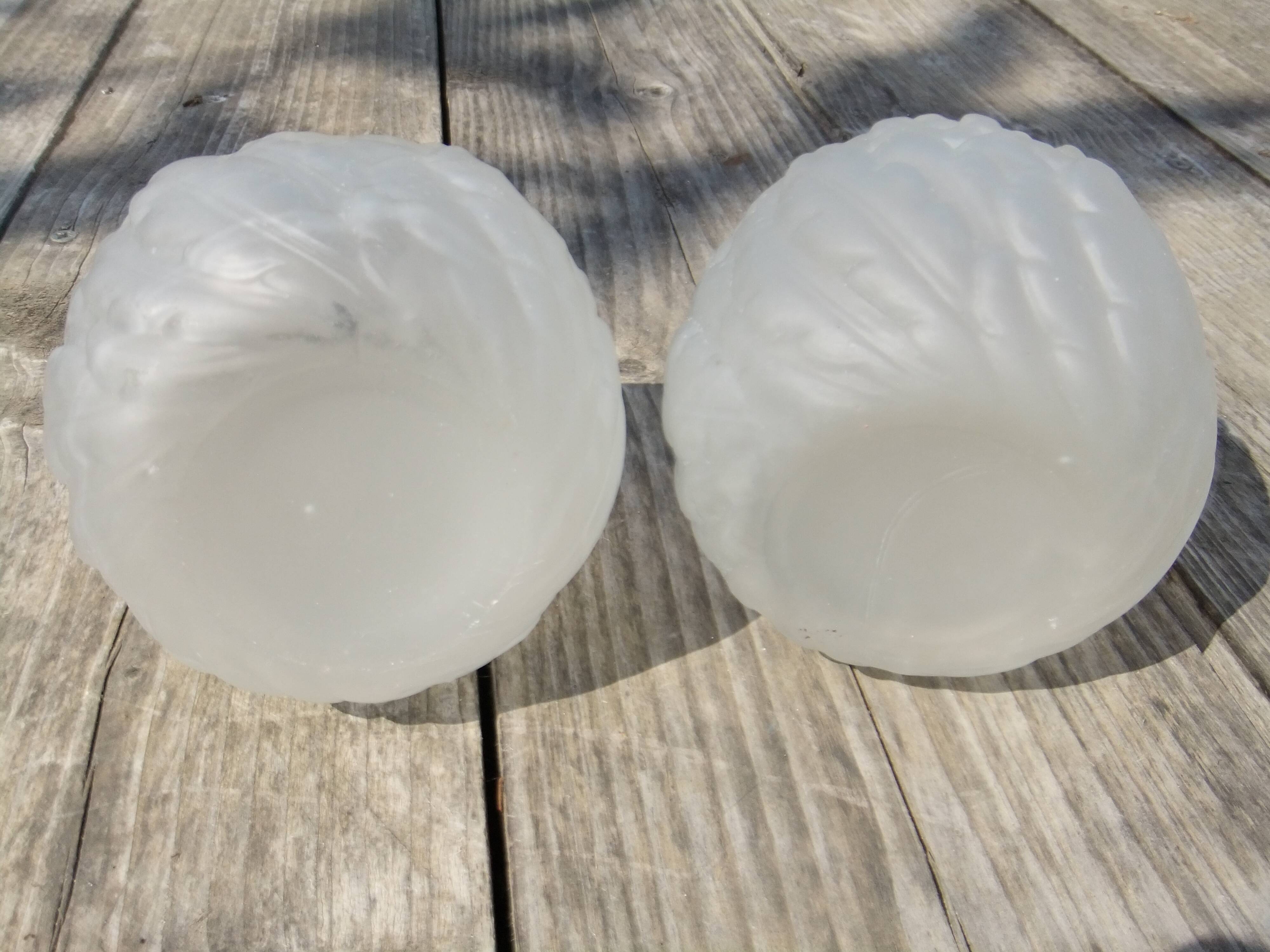 Art Deco ball vase pair with flower and leaf decor