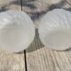 Art Deco ball vase pair with flower and leaf decor