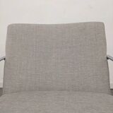 Pair of designer armchairs