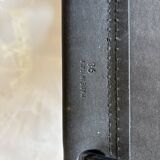 Set of 12 vintage chairs in black leather and tubular steel – Italy, 1970s
