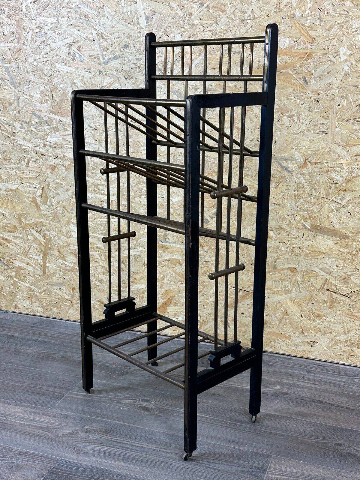Magazine rack from Wiener Werkstätte Austria made of mahogany & brass around 1900