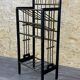 Porte-revues de Wiener Werkstätte Autriche en acajou et laiton vers 1900