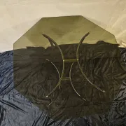 Smoked glass octagonal table from the early 1970s.