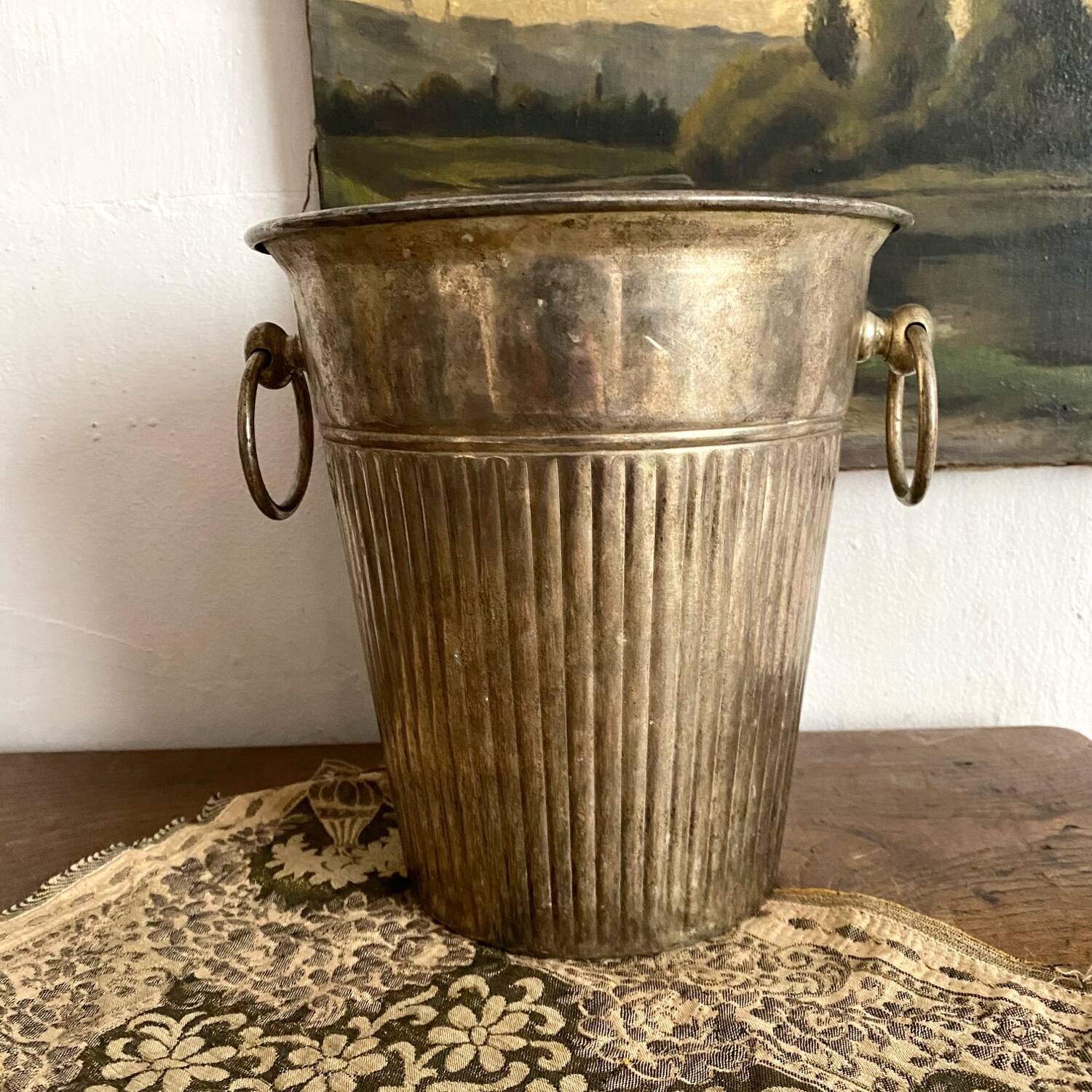 Patinated silver metal champagne bucket