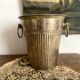 Patinated silver metal champagne bucket