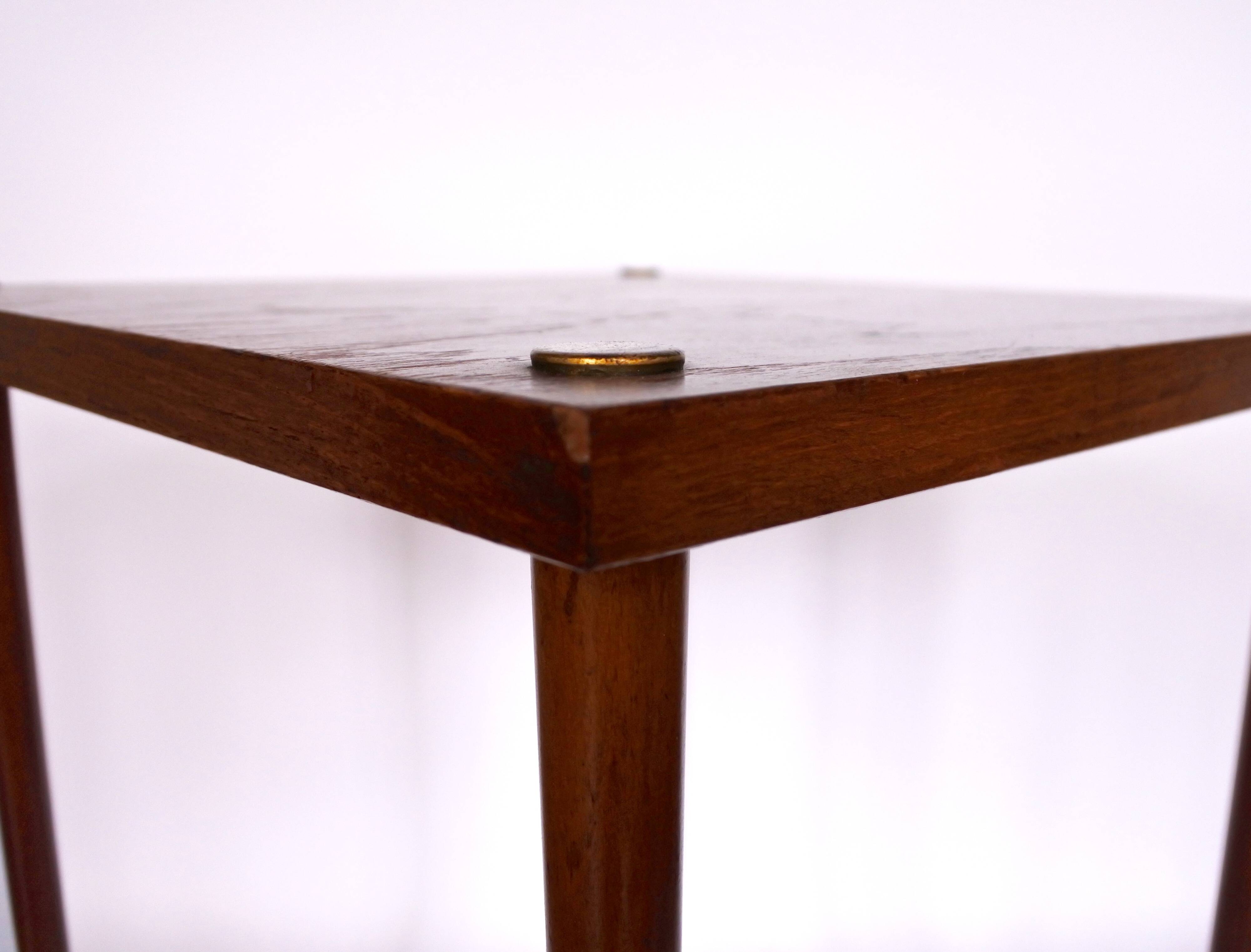 Teak wood side table with brass details