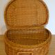 Half-moon rattan & wicker suitcase